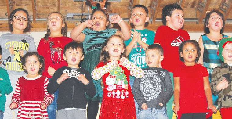 Jamieson Kindergarten students belt out a Christmas tune during their annual Christmas concert. Photo by Donna Duric.