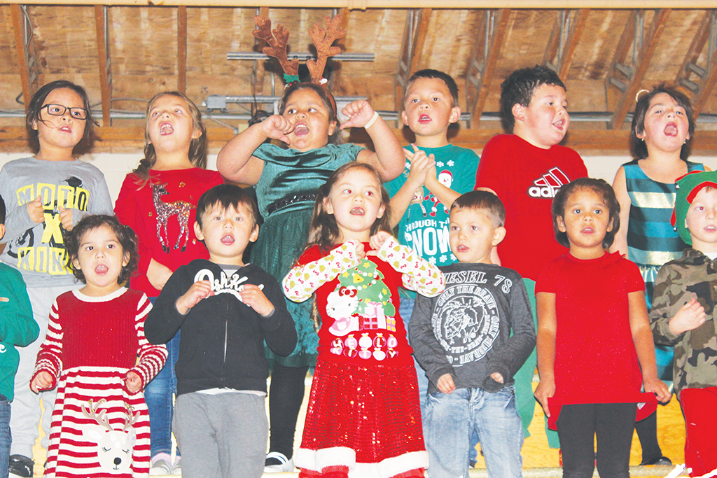 Jamieson Kindergarten students belt out a Christmas tune during their annual Christmas concert. Photo by Donna Duric.