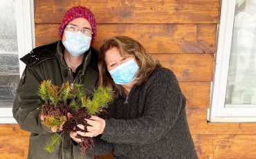 THE TREES HAVE ARRIVED!!!!! Turtle Island News publisher Lynda Powless and St Williams Nursery’s Gerry Birnstiel, Shipping Manager show off the pines and white cedars that will be among the trees given away Earth Day, Friday April 22 at Turtle Island News from 10 a.m. to 4 p.m. Don’t forget to drop by!