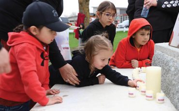 Those left behind In 2018 Six Nations mourned the loss of three community members killed in a vicious triple murder. Their families and children were left behind and showed they have not forgotten them by lighting candles at Ganohkwasra’s Red Dress Day Candlelight Vigil. (Photos by Jim C. Powless)