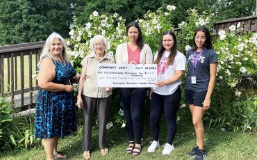 Ohsweken Baptist Church presenting Six Nations Child and Family Services with funds raised by donation. Pic-tured from left to right are church members Lorelei Isaacs and Bettey Johnson, and Child and Family Serv-ices’ Jocelyne Bryne, Shantel Bomberry, and Sierra Green. (Photo by Bree Duwyn)