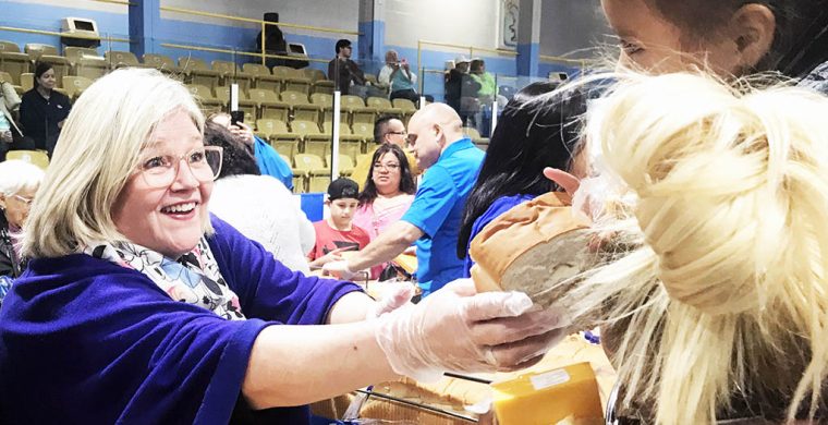 City of Hamilton’s new Mayor Andrea Horwath was one of several area mayors who joined in Six Nations annual Bread and Cheese fun Victoria Day at the SN Arena handing out over 8500 individually wrapped cheese packages and 2200 loaves of bread to all who came, Six Nations people and … friends. (Photo by Lisa Iesse)