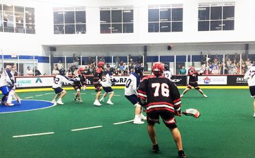 The Six Nations Rivermen, in dark jerseys, edged the host Oakville Rock in their opening game of the national Presidents Cup tournament on Sunday. Photo credit Sam Laskaris.