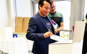  Six Nations Elected Chief Mark Hill drops his ballot in ballot box during the August 24 vote.