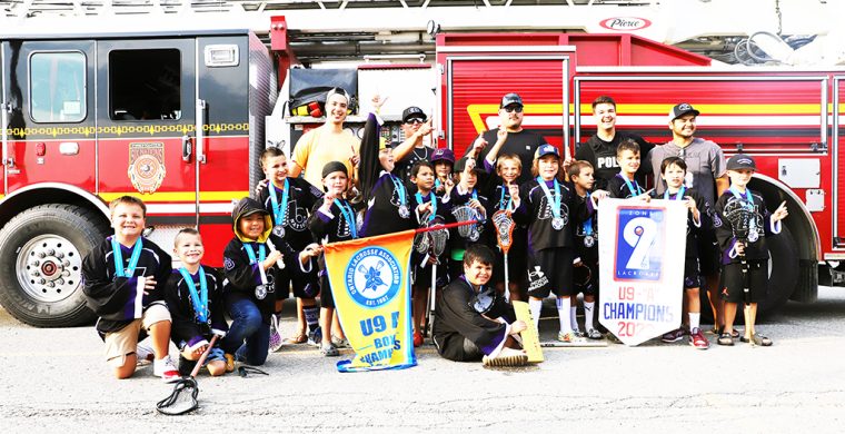 Six Nations U91 team won the Ontario A Championship at the provincials last week bringing a crowd of locals out to welcome the young champions home in style. Six Nations Fire and police led a long parade through the community to the Six Nations arena in a community welcome to the champions. (Photo by Jim C. Powless)