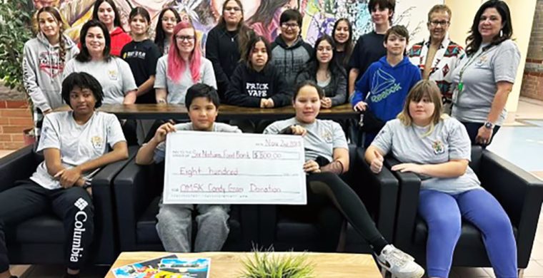 The Oliver M. Smith Elementry School Student Council, made up of Grade 7&8 students raised $800 recently to donate to the Six Nations Food Bank. OMSK established a student to give students leadership opportunities and positive role models for younger students. Student council reps took Candy Gram orders from each class to raise funds for the Six Nations Food Bank. Mary Monture attended to receive the cheque on behalf of the Food Bank. With parent support, the OMSK student council was able to raise $800.00 (Supplied Photo)