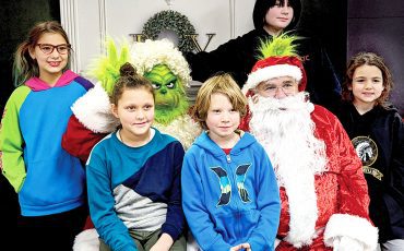 It’s all about creating memories. That includes photos with Santa and the Grinch.