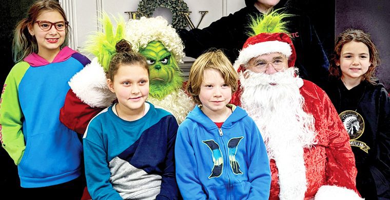 It’s all about creating memories. That includes photos with Santa and the Grinch.