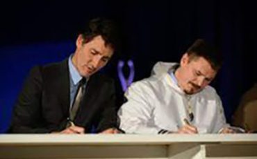 Prime Minister Justin Trudeau and Nunavut Premier P.J. Akeeagok sign the Nunavut devolution agreement in Iqaluit on Thursday.Prime Minister Justin Trudeau and Nunavut Premier P.J. Akeeagok sign the Nunavut devolution agreement in Iqaluit on Thursday.