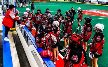 Hannah Lazare, on bench, will serve as the head coach for both Haudenosaunee Jr. Selects teams that will compete at USBOXLA in California. Photo courtesy Hannah Lazare.