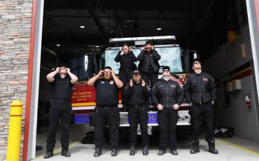 Six Nations Fire Fighters put on approved eclipse glasses to promote safety during Monday’s solar eclipse. (Photo by Jim C. Powless)