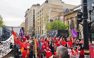 A group of local organizers with support from De dwa da dehs nye>s Aboriginal Health Centre turned downtown Hamilton into a sea of red on Red Dress Day - Sunday, May 5th. (Photo by Ashley Neganiwina)