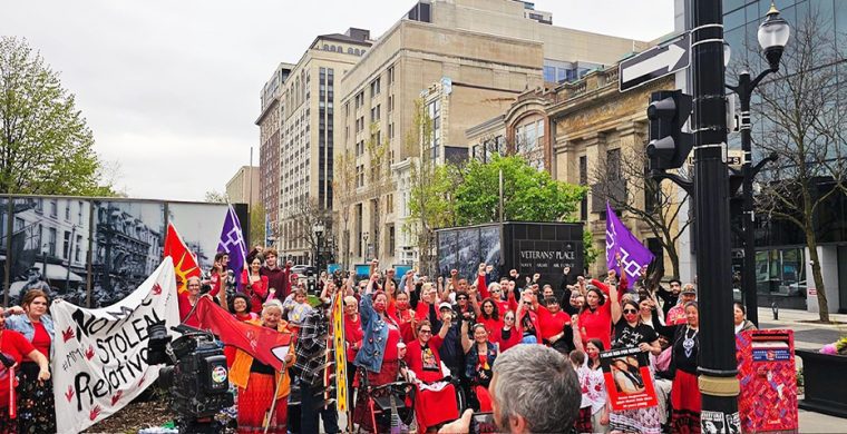 A group of local organizers with support from De dwa da dehs nye>s Aboriginal Health Centre turned downtown Hamilton into a sea of red on Red Dress Day - Sunday, May 5th. (Photo by Ashley Neganiwina)