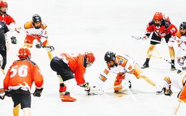 The visiting Six Nations Rivermen, in full orange jerseys, split their past two games with the Brooklin Merchants. Photo courtesy Sam Hossack.