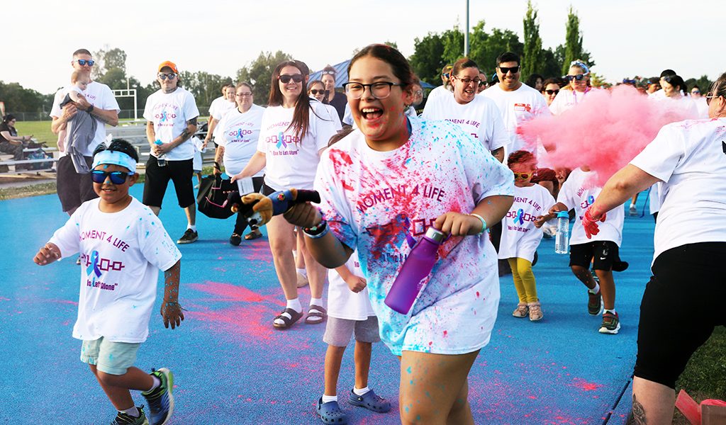 Six Nations annual Colour Run to mark World Suicide Prevention Day hit the track with an army of participants that soon turned into colourful runners. More page 5. (Photo by Jim C. Powless)