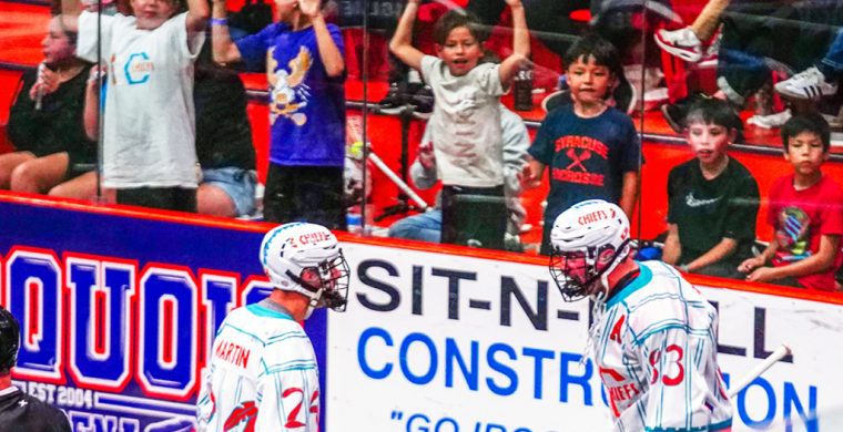 Justin Martin (left) and Randy Staats get ready to hug it out after a Chiefs’ goal on Monday night. Photo by Darryl Smart.