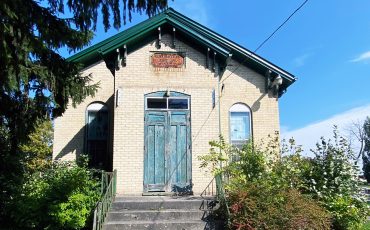 The Haudenosaunee Confederacy Chiefs Council building sits empty while under renovations. The building was built 161 years before Canada imposed an elected system here. (Photo by Jim C. Powless)