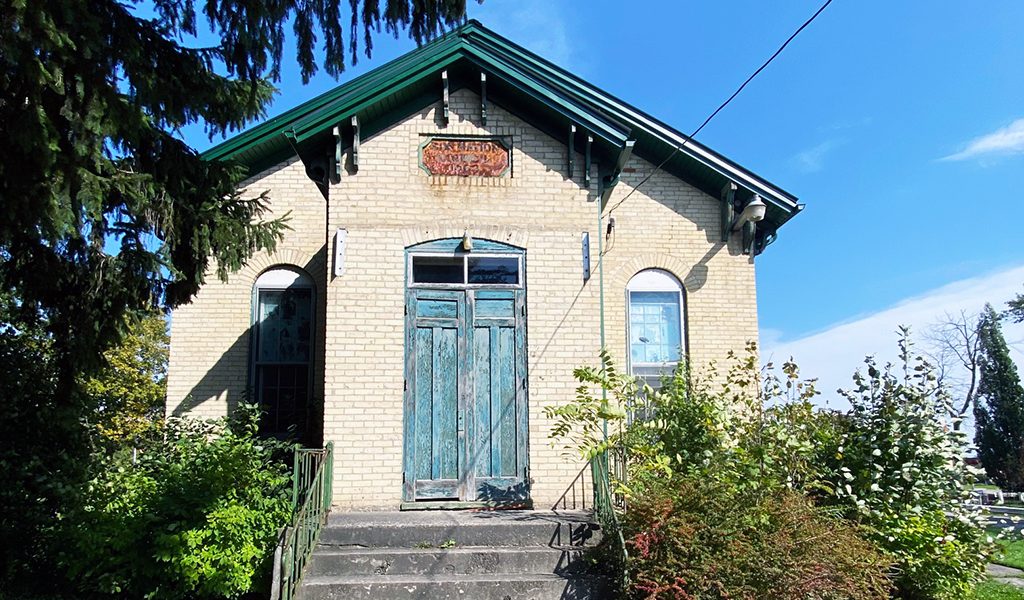 The Haudenosaunee Confederacy Chiefs Council building sits empty while under renovations. The building was built 161 years before Canada imposed an elected system here. (Photo by Jim C. Powless)