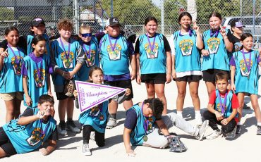 Each player from Oliver M. Smith got a gold medal for their championship win.