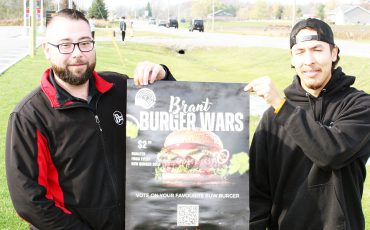 Burger Barn manager Paul McAllister (left) created the winning burger. (Photo by Austin Evans)