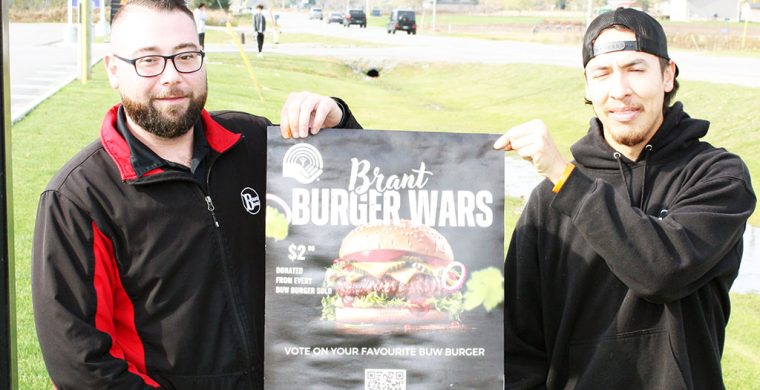 Burger Barn manager Paul McAllister (left) created the winning burger. (Photo by Austin Evans)