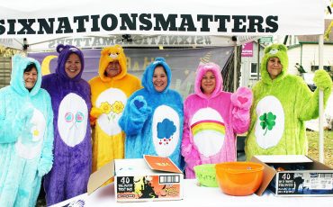 Event organizer Mandi Styres (third from the right) welcomed trick-or-treaters alongside the rest of Six Nations Social Services. (Photo by Austin Evans)