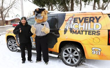 Six Nations Police along with everyone’s buddy “Buster” were spotted at Veterans’ Park last week setting up to collect donations for Six Nations Food Bank in time for Christmas. (Photo by Jim C. Powless)