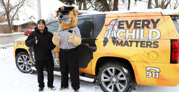 Six Nations Police along with everyone’s buddy “Buster” were spotted at Veterans’ Park last week setting up to collect donations for Six Nations Food Bank in time for Christmas. (Photo by Jim C. Powless)