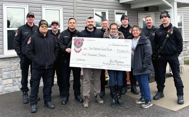 Six Nations giving spirit was in full force over the holidays including from the Six Nations Fire Fighters Association who donated $6,000 to the Six Nations Food Bank. The donation came from their first annual golf tournament held in 2024. The fire fighters included Alex Howling, Chancy Johnson, Ben Purchase, Charles Gamble, Martin MacNaughton, Kevin McDonald, Rory Smith, Braiden Shaw, Kolton Debus. Six Nations Food Bank board chair Mary Monture and coordinator Tracey Martin.