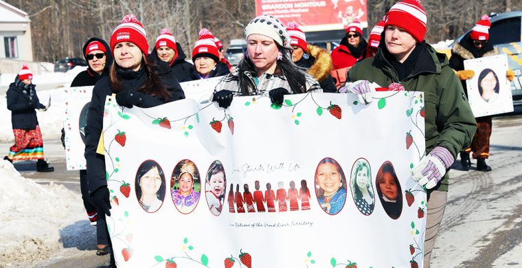 Families, friends and supporters hit Chiefswood Road at Six Nations of the Grand River on Feb. 14, for a Valentine’s march through Ohsweken taking part in the annual Murdered and Missing Indigenous Women Day Memorial March, an annual event honouring Missing and Murdered Indigenous Women and Girls (MMIWG) across Canada. (Photo by Jim C. Powless)