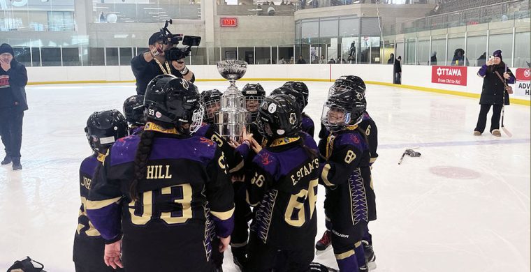 Local girls’ Under-9 team registers six lopsided victories at Little NHL en route to championship