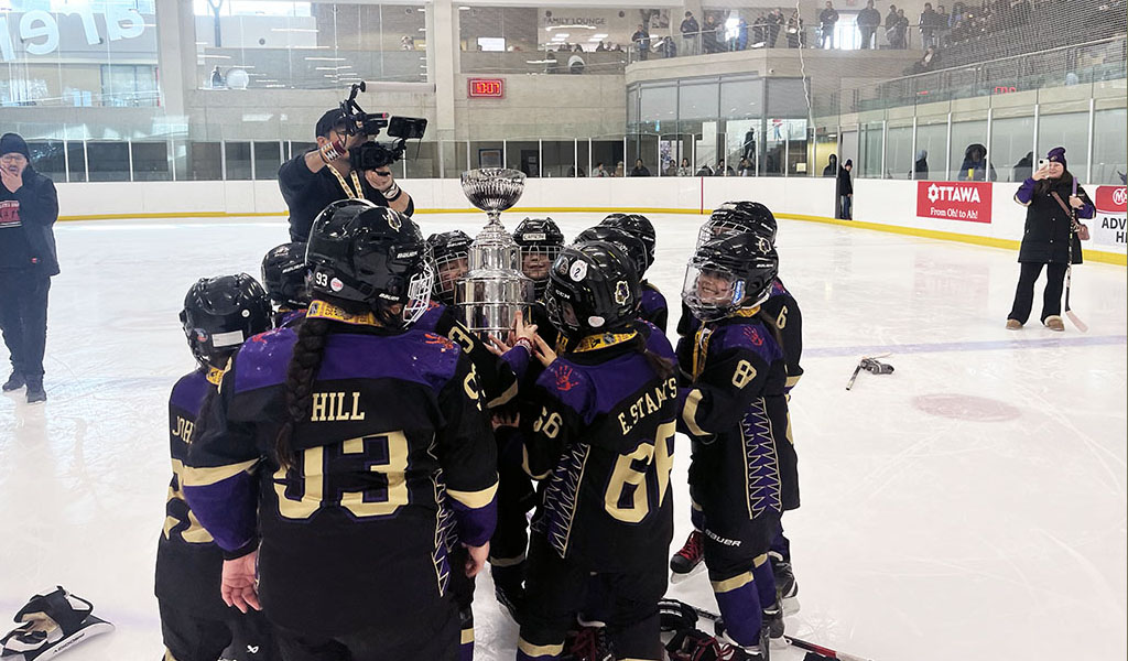 Local girls’ Under-9 team registers six lopsided victories at Little NHL en route to championship