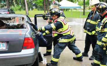 Not even rain can stop the fun of Six Nations Community Awareness. Six Nations Fire department thrilled community members with a display of firefighting techniques and of course a barbecue! (Photo by Jim C. Powless)