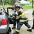 Not even rain can stop the fun of Six Nations Community Awareness. Six Nations Fire department thrilled community members with a display of firefighting techniques and of course a barbecue! (Photo by Jim C. Powless)