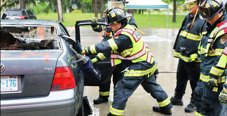 Not even rain can stop the fun of Six Nations Community Awareness. Six Nations Fire department thrilled community members with a display of firefighting techniques and of course a barbecue! (Photo by Jim C. Powless)