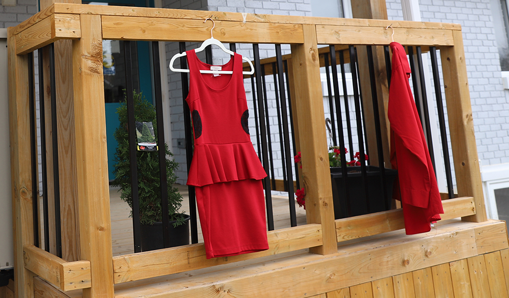 Six Nations marked Murdered and Missing Indigenous Women and Girls day with displays of red dresses hanging on porches and with local events. (Photo by Jim C. Powless) See story page 5.