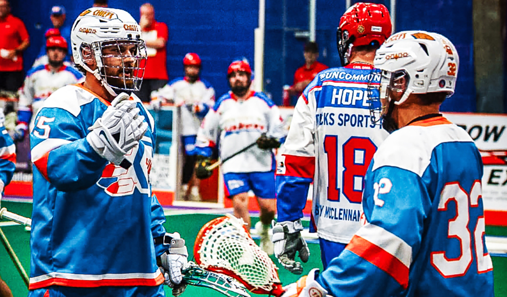 Members of the Six Nations Chiefs, in blue jerseys, downed the visiting Peterborough Lakers in a match last Tuesday at the ILA. Photo by Darryl Smart.