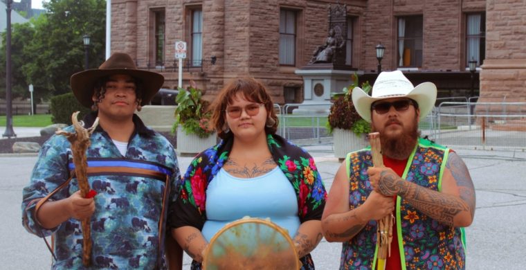 Left: First Nation youth movements held a rally at Queen’s Park in Toronto on Friday August 8, 2025 to welcome the arrival of youth walkers from Timmins, Ontario. From L-R are: Ramon Kataquapit, Okiniwak; Keira Spence, Youth Rising Together and Tristan Ashishkeesh, Mahmo Inninuwuk Wiibuseego-stamok. ( Photo Ramon Kataquapit )