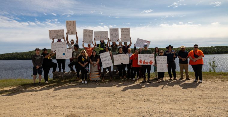 Youth Rising Together brought together local youth and supporters for a community rally in Mattagami FN on August 18, 2025. The group is pictured here with Chief Jennifer Constant (in front with the Mattagami FN broach) overlooking Mattagami Lake. (Photo by Trentin Thomas)
