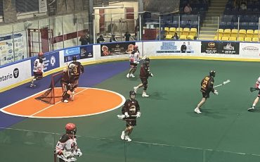 The Six Nations Rivermen (white jerseys) took on the Snake Island Muskies in their Presidents Cup opening game on Sunday. Photo by Sam Laskaris.