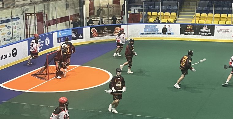 The Six Nations Rivermen (white jerseys) took on the Snake Island Muskies in their Presidents Cup opening game on Sunday. Photo by Sam Laskaris.