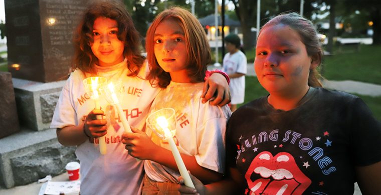 Friends met at Veterans’ Park and lit candles spreading awareness of suicide prevention.