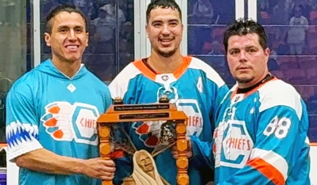 Six Nations Chiefs’ captains, left to right, Lyle Thompson, Brendan Bomberry and Cody Jamieson, with the Major Series Lacrosse championship trophy. Photo courtesy Six Nations Chiefs.