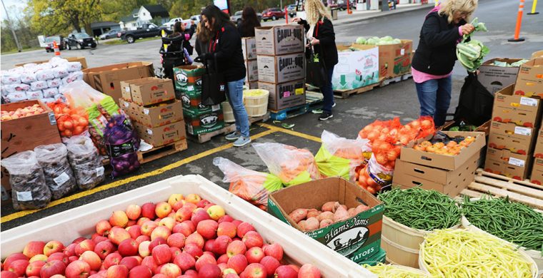Tonnes of harvest vegetables filled a large portion of the Route 54 Variety’s parking lot about to be given away to people who showed up. (Photos by Jim C. Powless)