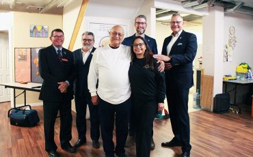 Coun. Richard Carpenter, Mayor David Bailey, Andrew Trevor, Alma Arguello, Parliamentary assistant Matthew Rae and MPP Will Bouma celebrate Ontario’s $4.8 million investment in Brantford Native Housing’s upcoming supportive housing project.
