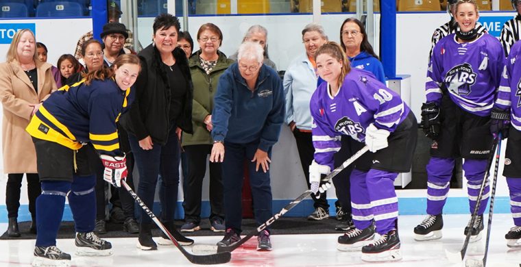 Former local hockey star Helen Lickers drops the ceremonial puck at the Six Nations Stars’ home opener this Friday. The pre-game ceremony included Six Nations Chief Sherri-Lyn Hill on her left.