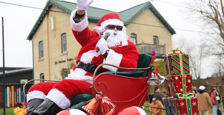 Leading a parade of floats, Santa Claus arrived at Six Nations Saturday and made his way through Ohsweken. (Photo by Jim C Powless)