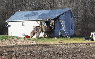 Six Nations Firefighters responded to a blaze at a house at 1621 Fifth Line Saturday Nov. 22. The fire started on the deck. Damage estimates were not available at press time. There were no injuries and Six Nations Fire Chief Mike Seth said the cause is under investigation. (Photo by Jim C Powless)