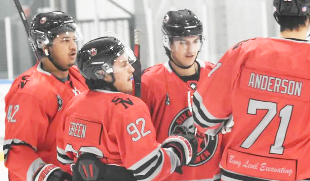 The Six Nations Ironmen celebrated a road win against the Halton Hills Coyotes on Saturday. Photo by Honee Anderson.