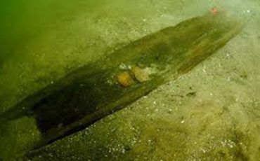 Underwater image of dugout canoe from Lake Mendota on June 6, 2021. (Courtesy: Tamara Thomsen - Wisconsin Historical Society)